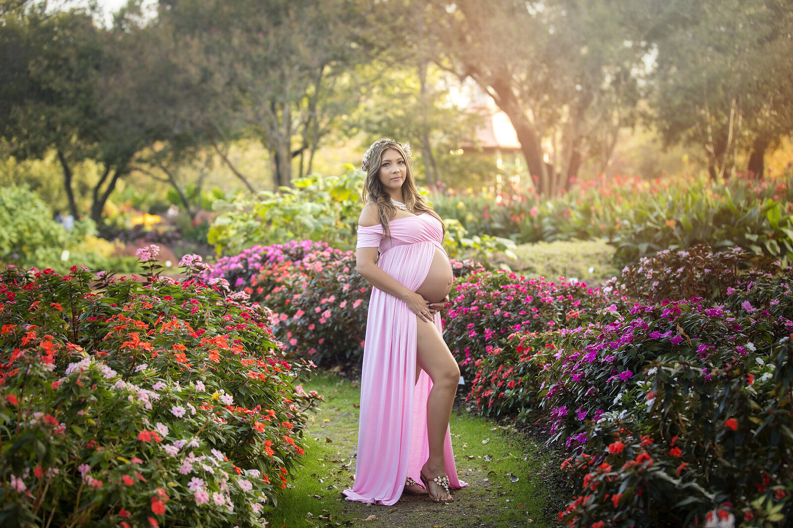 Maternity session in field of flowers.
