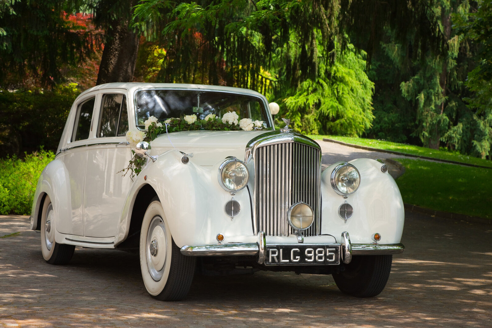Vintage White Wedding getaway car