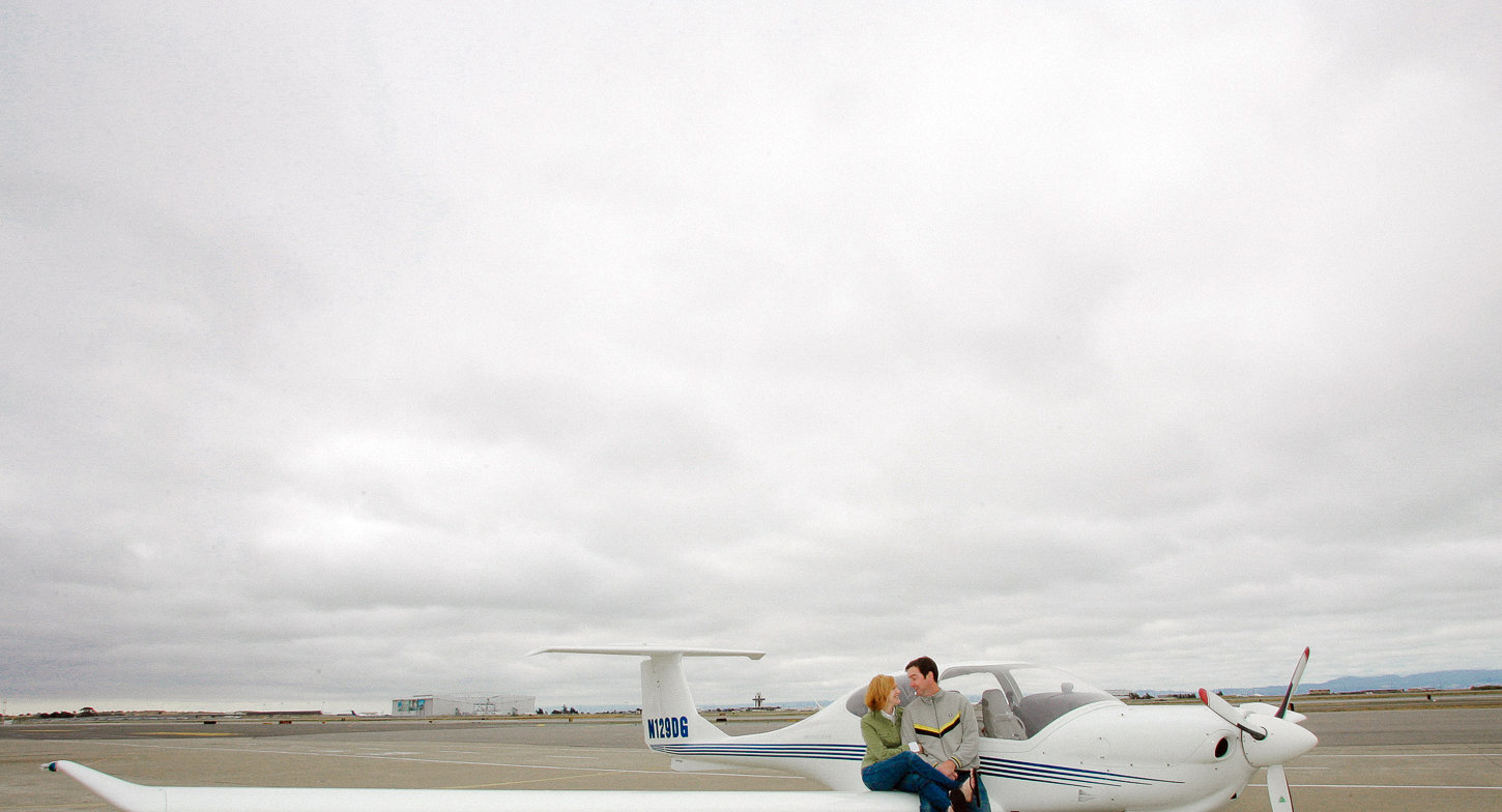 Engagement photography in San Francisco with airplane