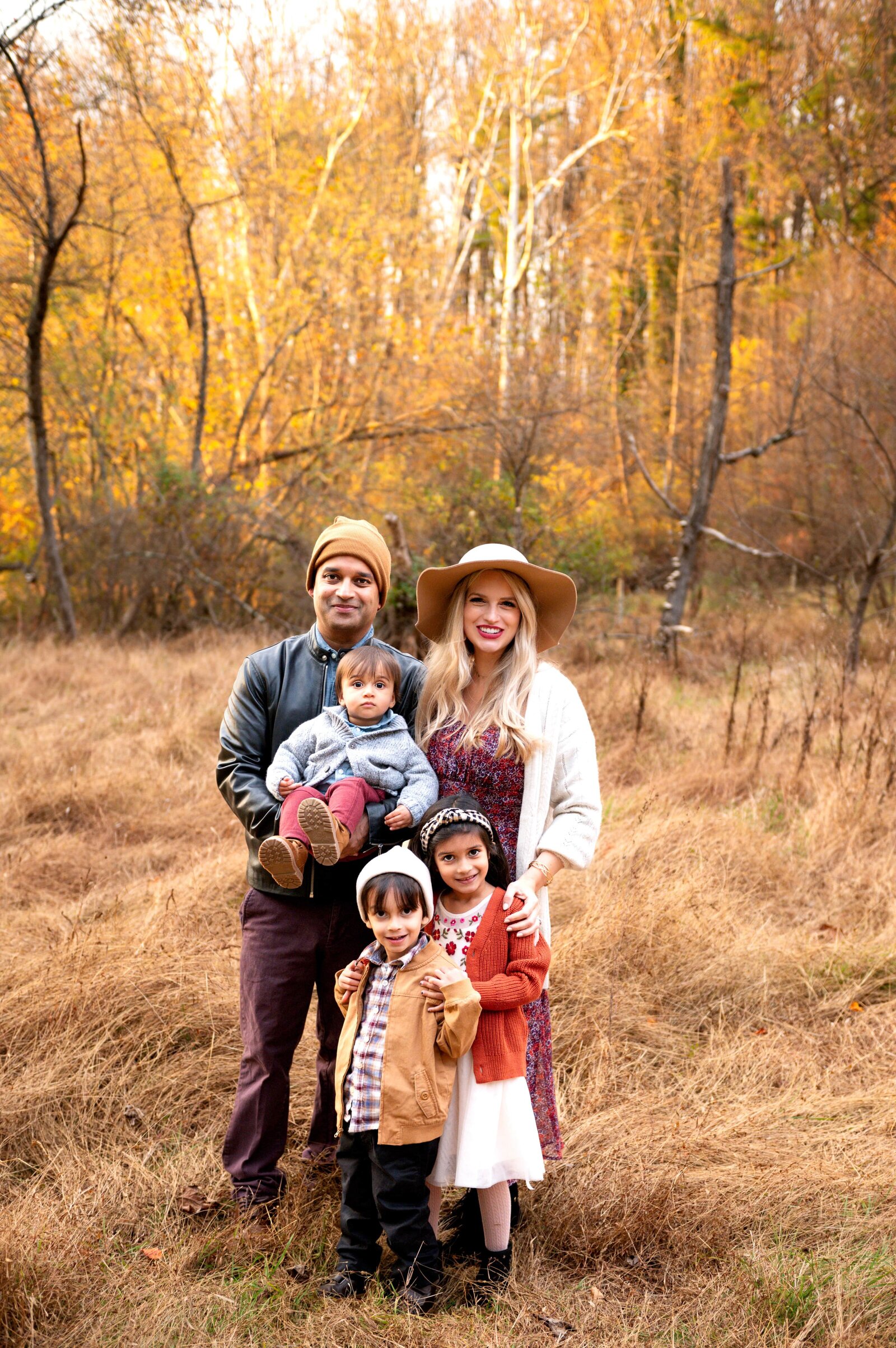 Fall family Photography  session in tall gold grass in Towson, Maryland