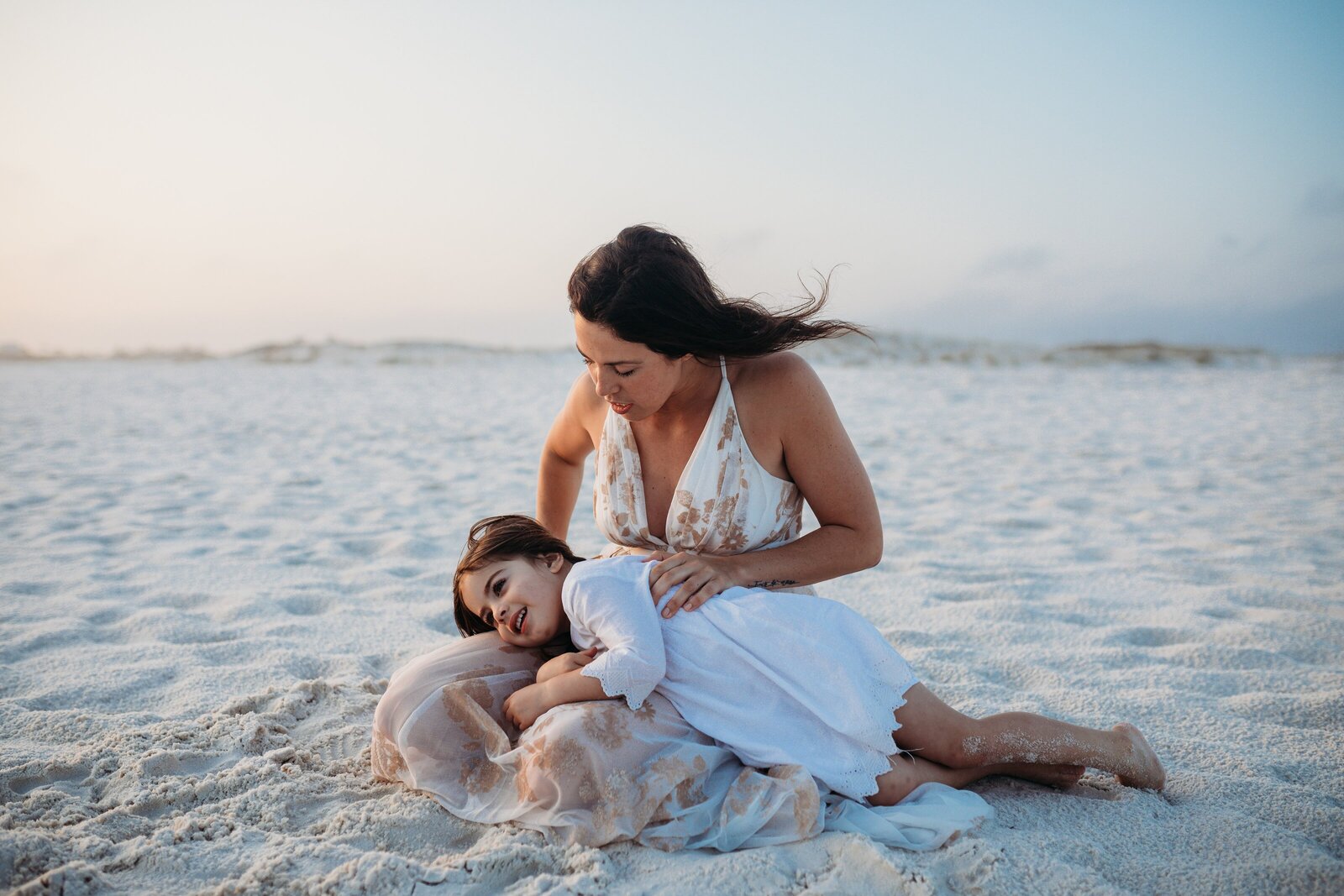 Mother and daughter family photo session at Johnson Beach in Perdido Key, FL