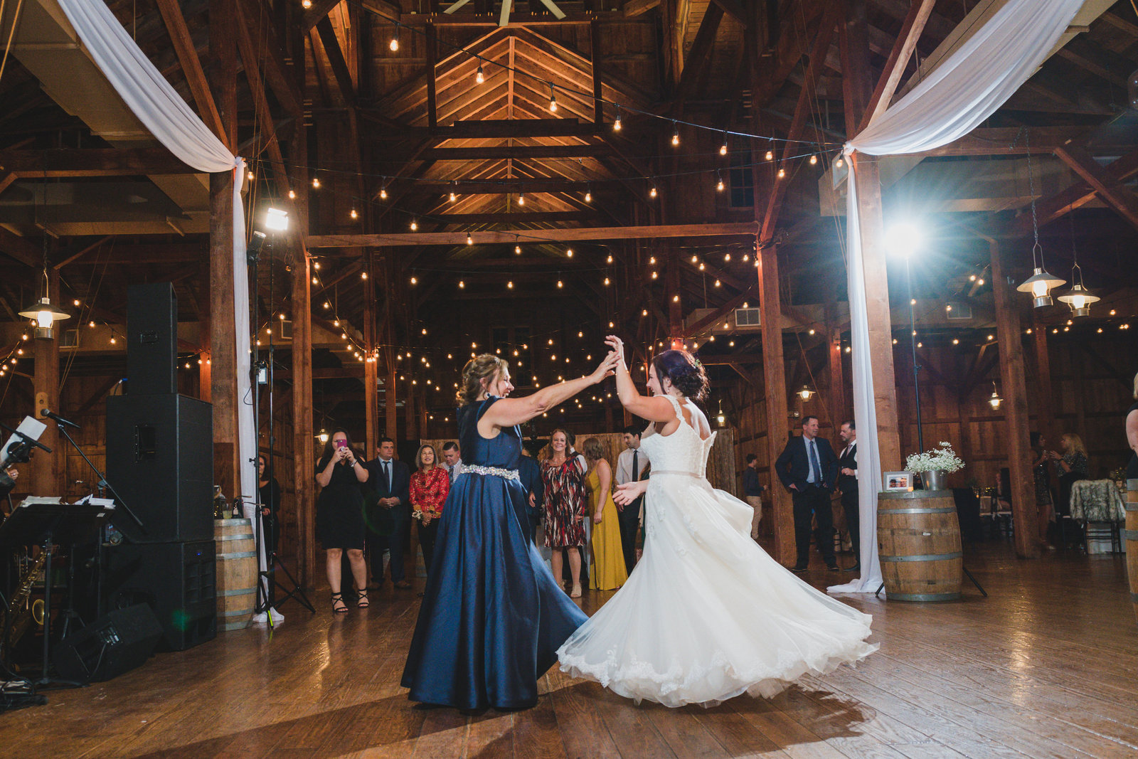 bride and mom dancing at wedding at The Barn at Old Bethpage