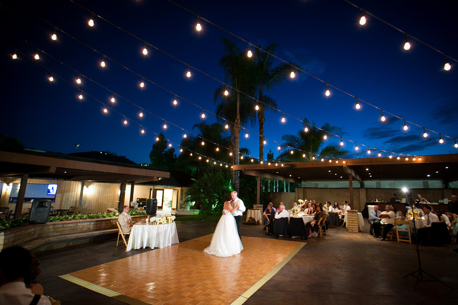 La Jolla Shores Tennis Club wedding photos nigh shot beautiful lights