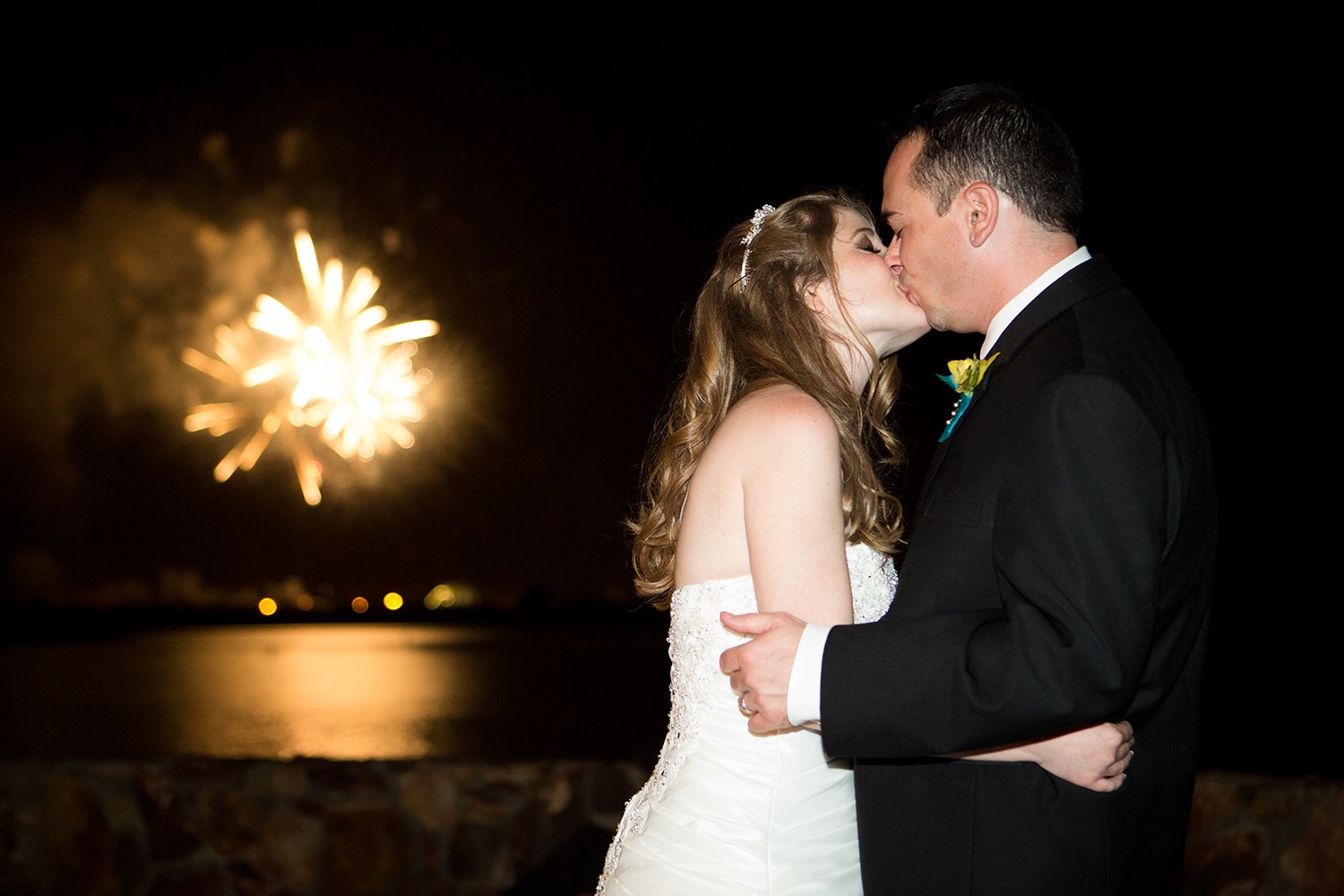 bride and groom with fireworks at hilton mission bay