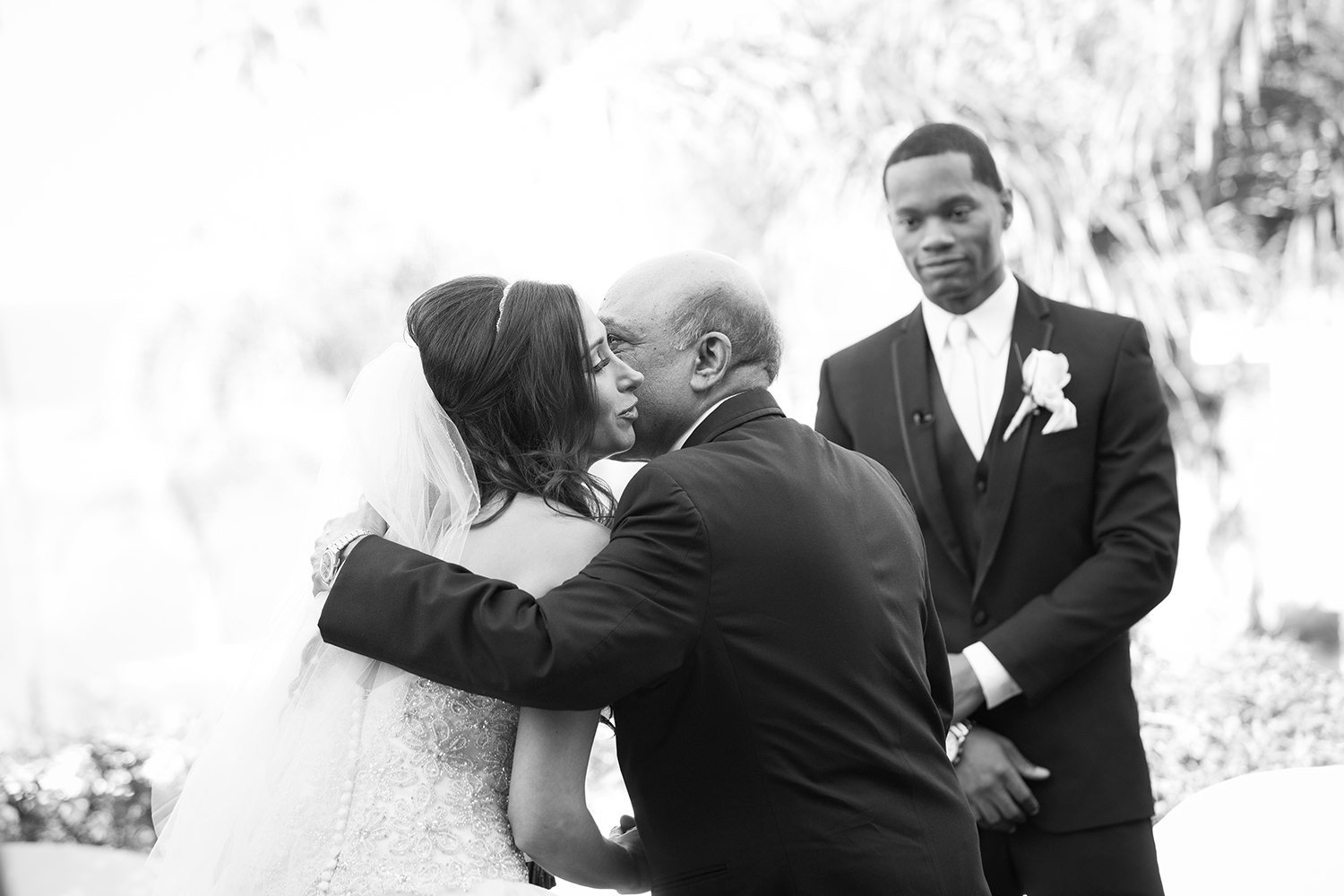 Sweet moment as the brides father gives her away at the ceremony