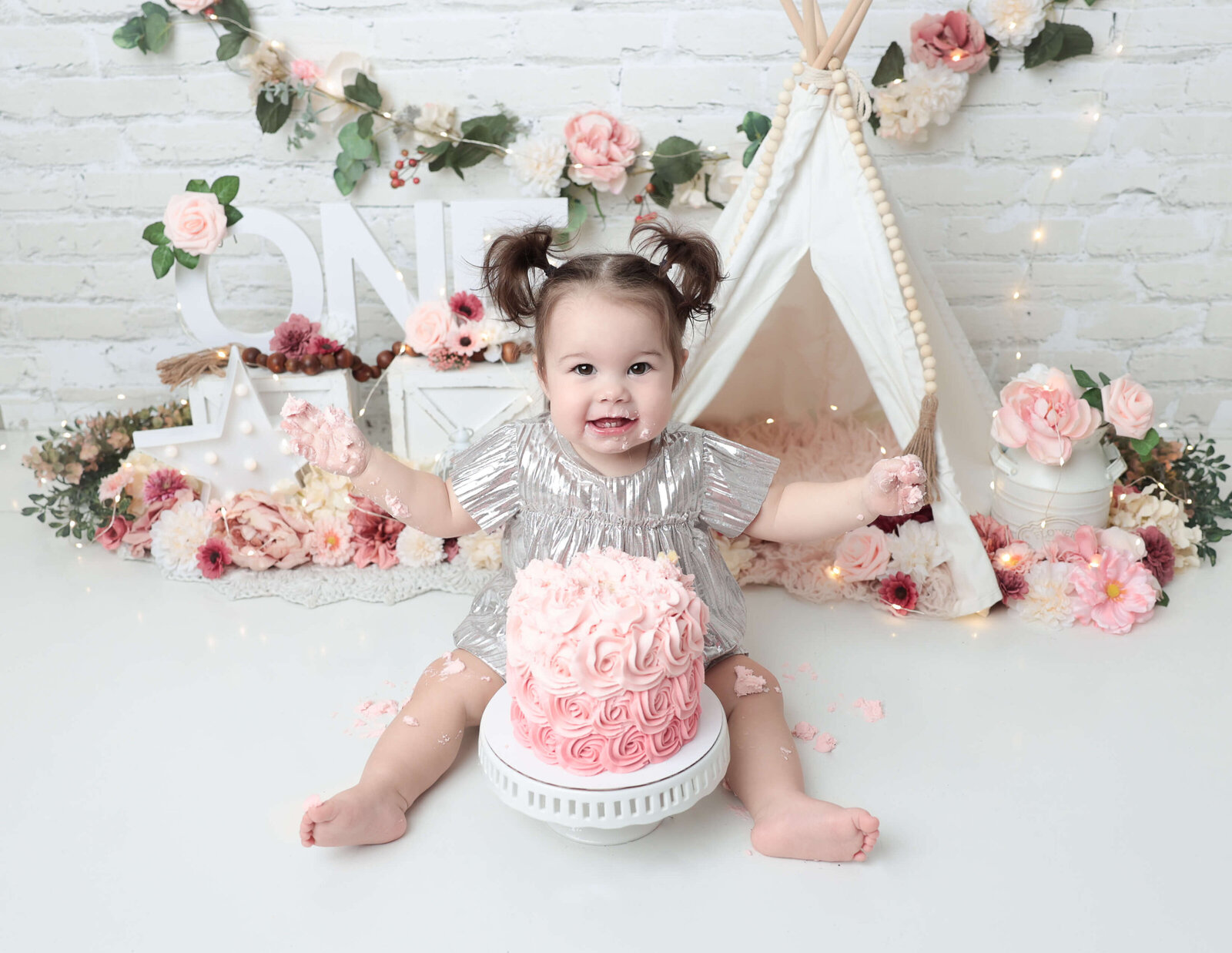Boho themed cake smash with adorable girl at our Rochester, NY studio.