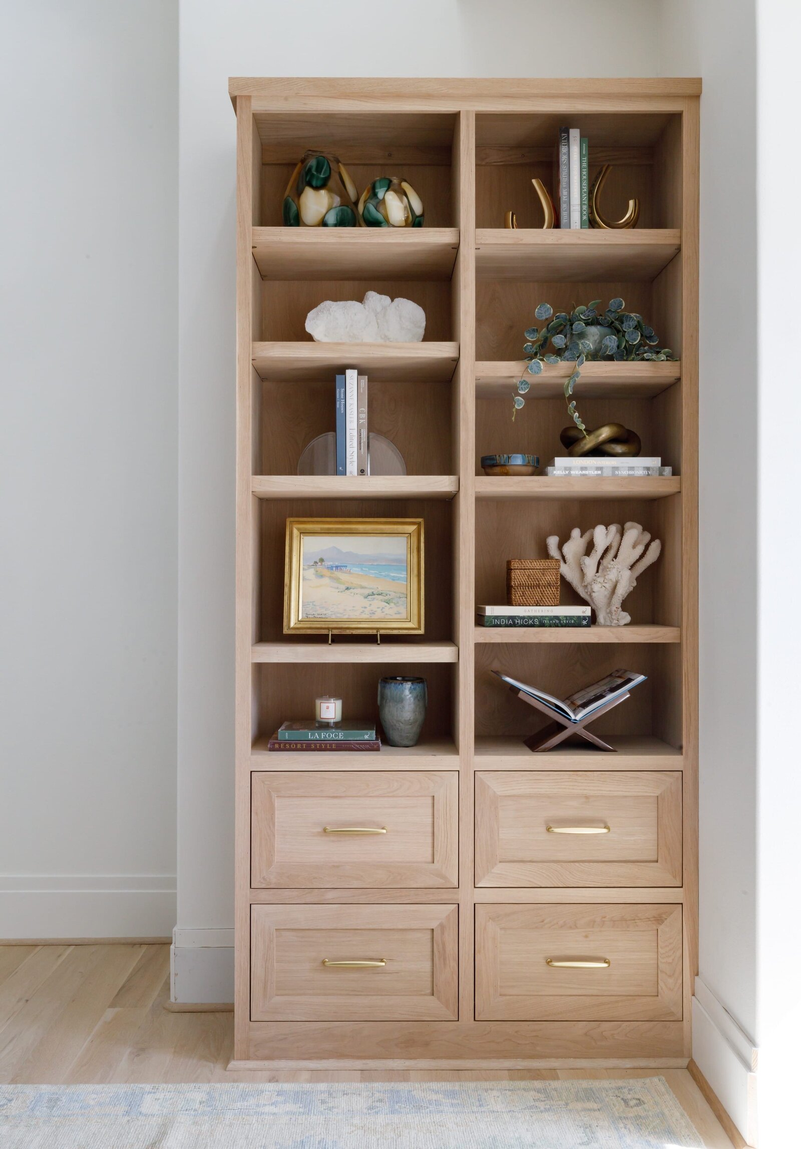 vision and hammer styling shelves on light wooden cabinets