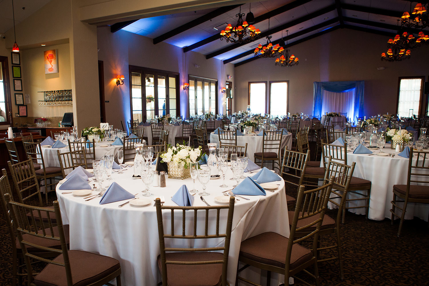reception space at wedgewood blue uplighting