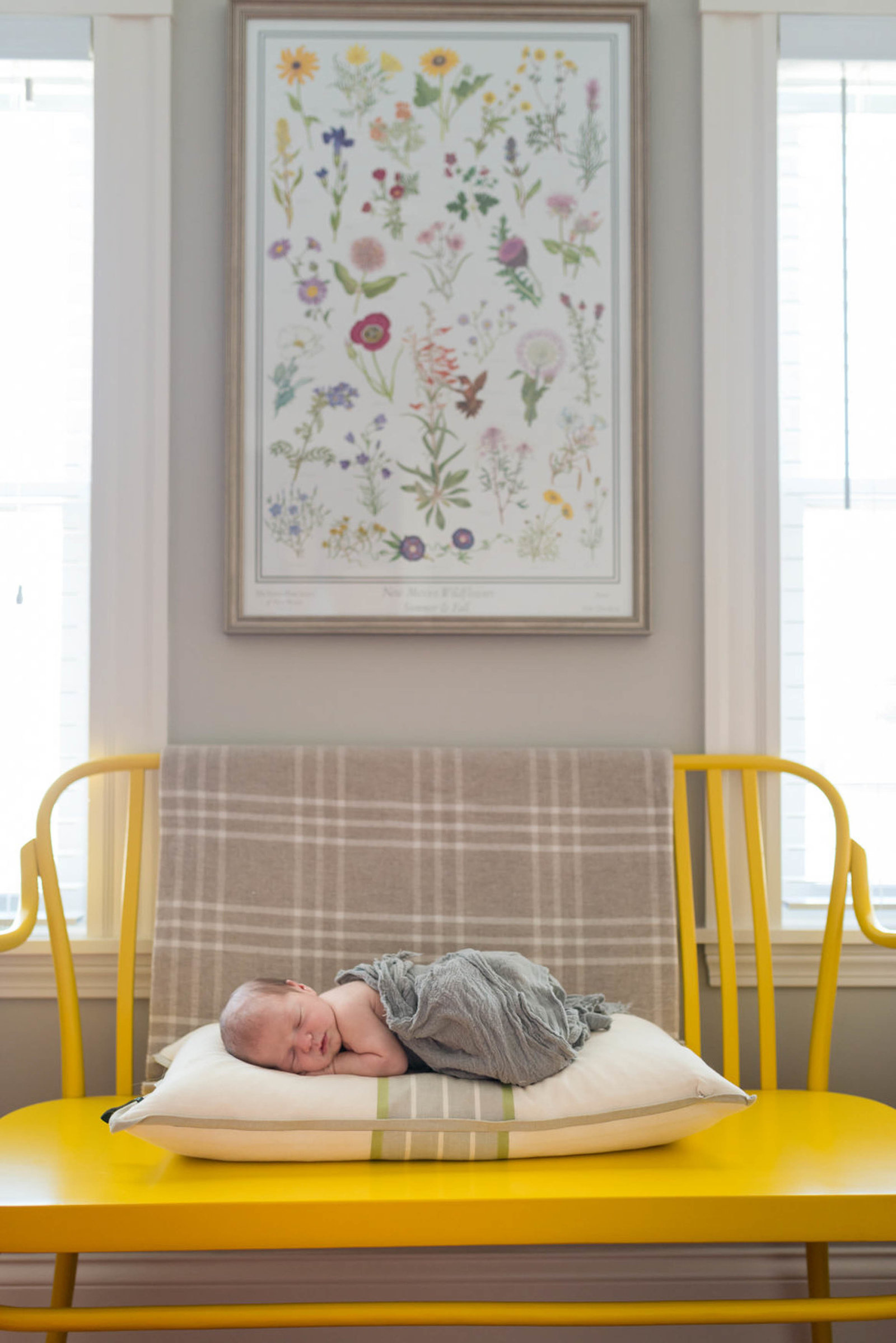 Newborn posed at home lifestyle session Boston in chair