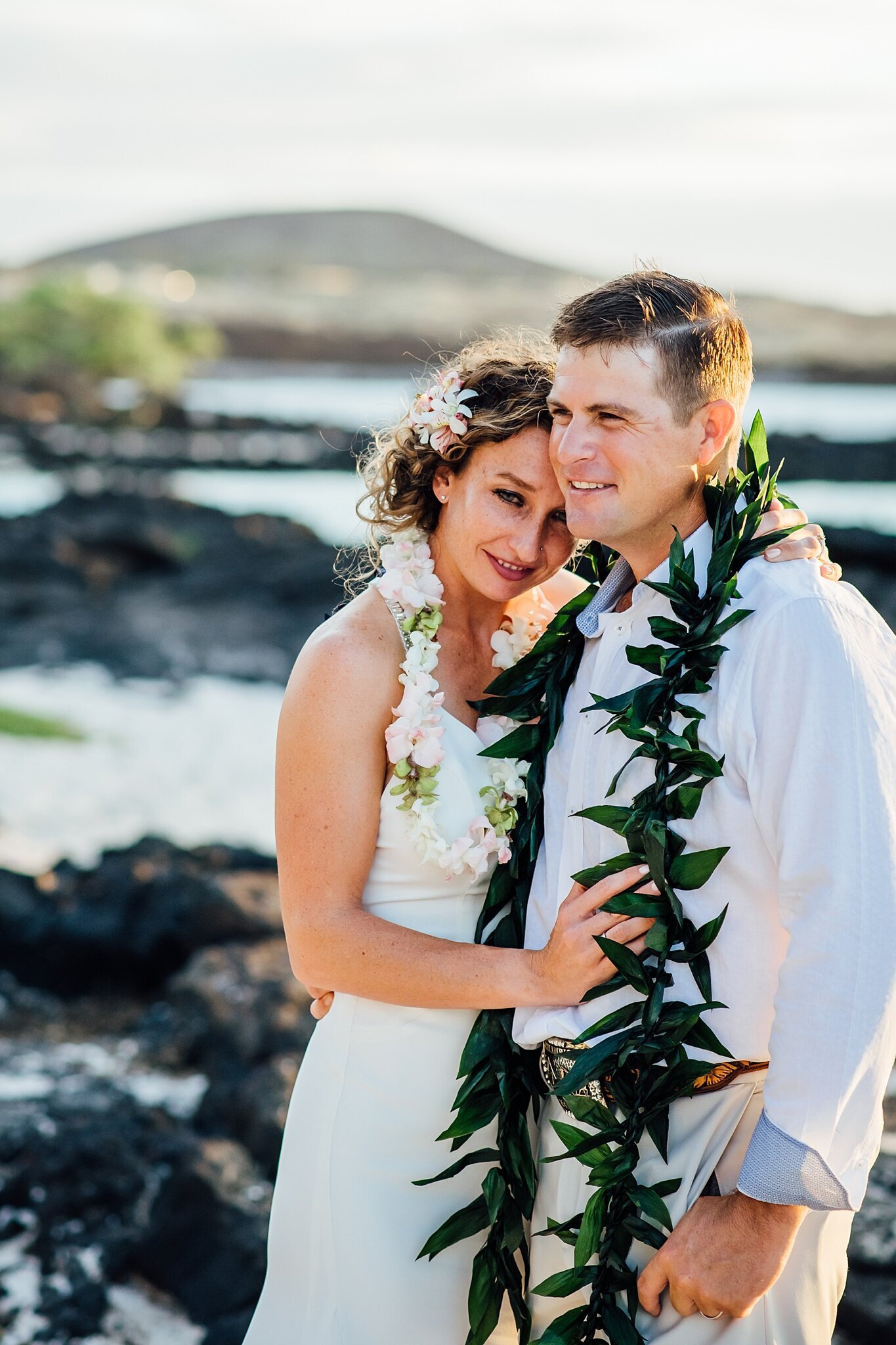 sweet moment right after the hawaii wedding ceremony