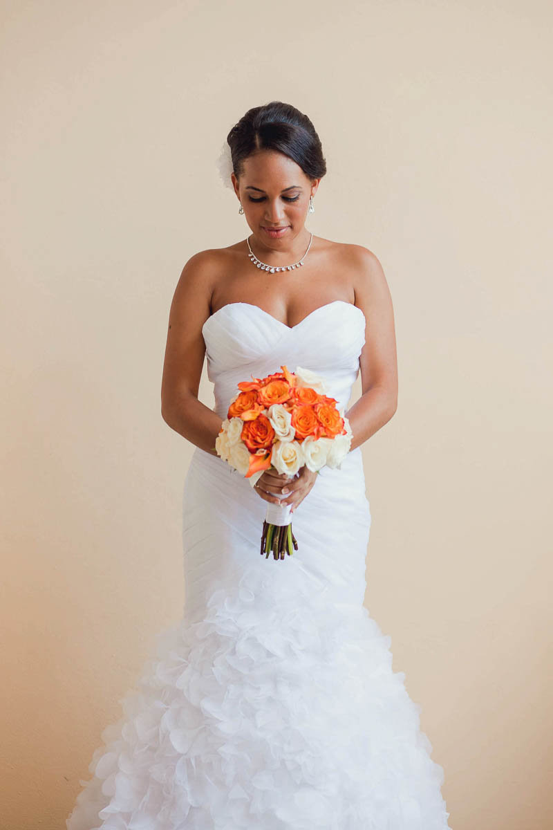 Bride poses, Jamaican Destination Wedding, Iberostar Rose Hall Suites, Montego Bay. Kate Timbers Photography.