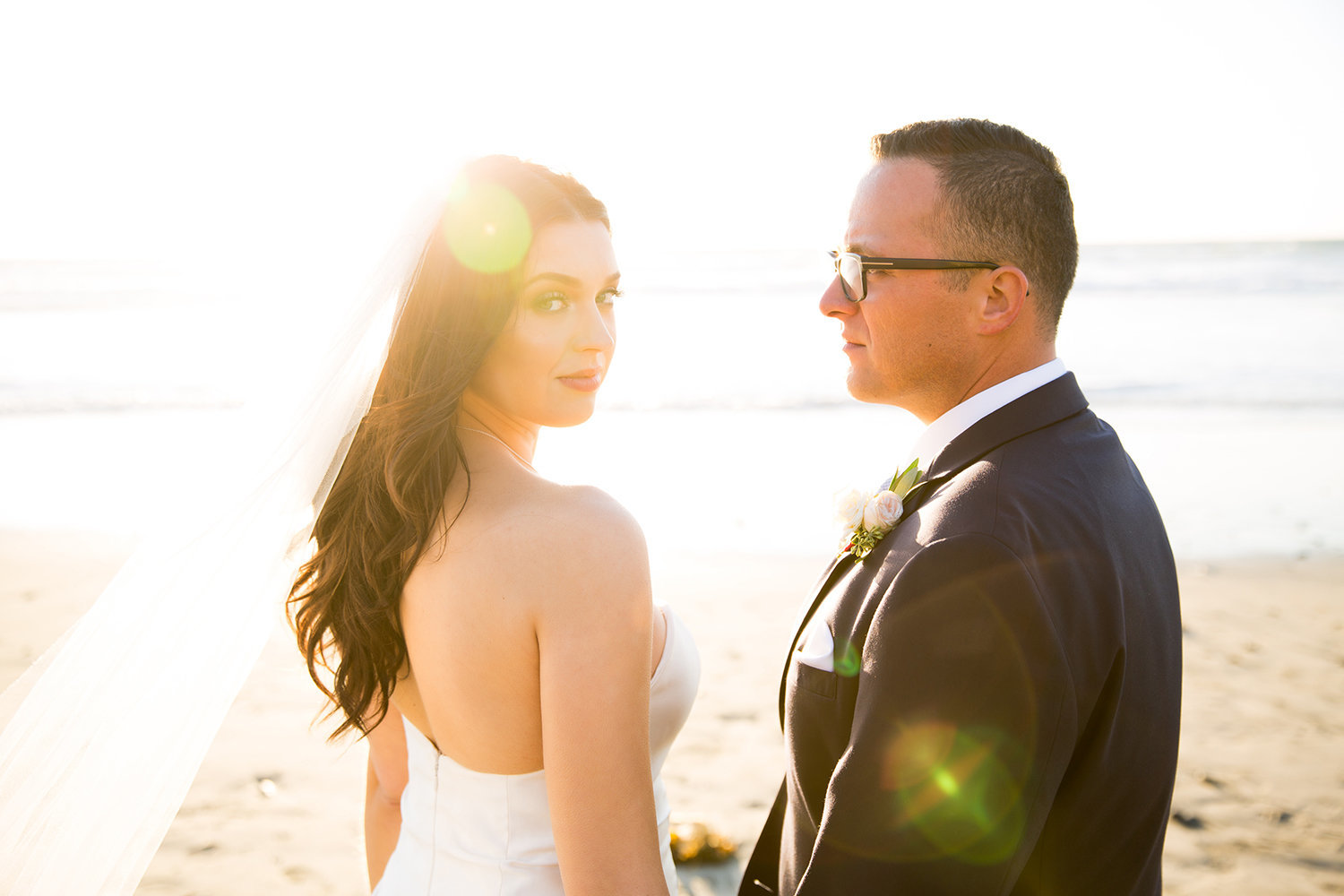 Dramatic Sunset Lighting for Wedding Couple for Their Del Mar Wedding