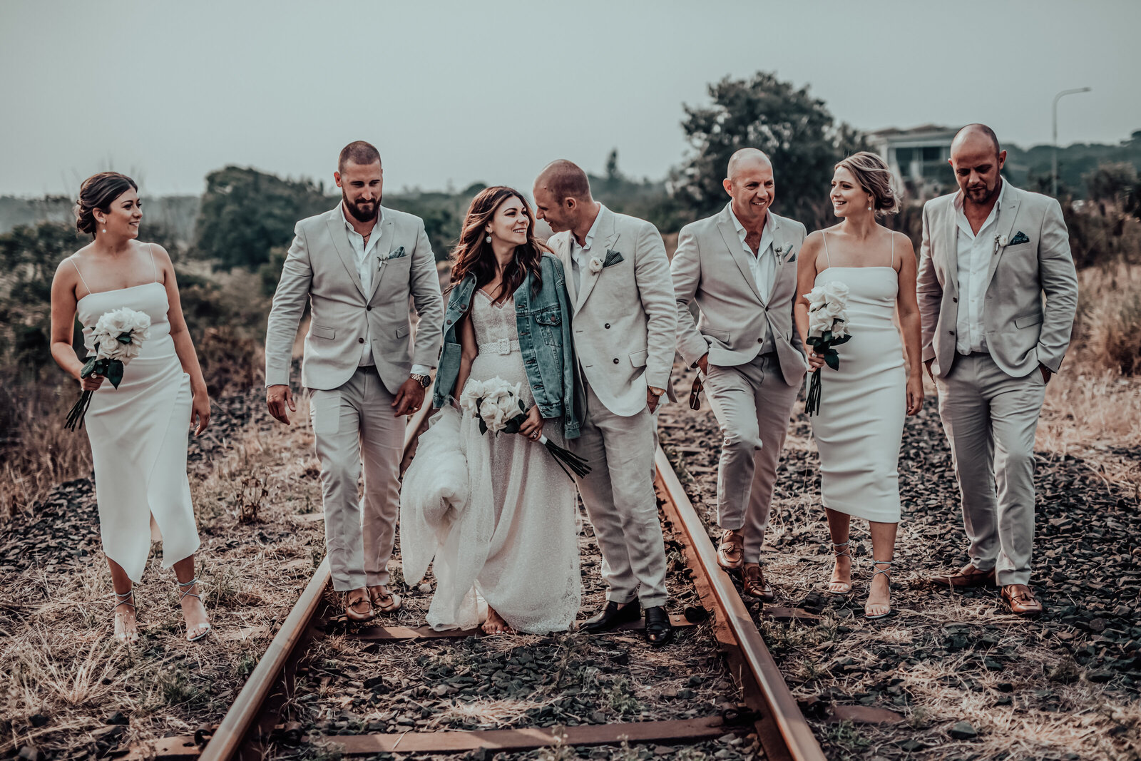 Wedded Couple with Friends at Railway Track