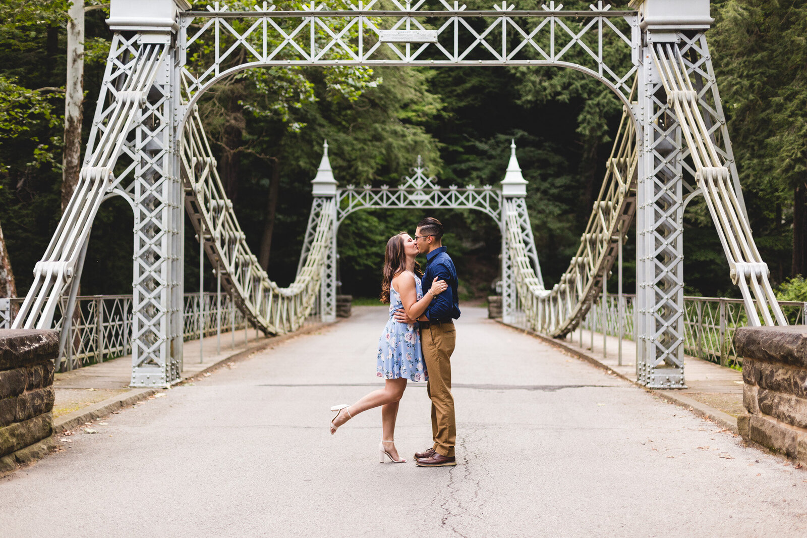 youngstown ohio engagement photography kissing on bridge