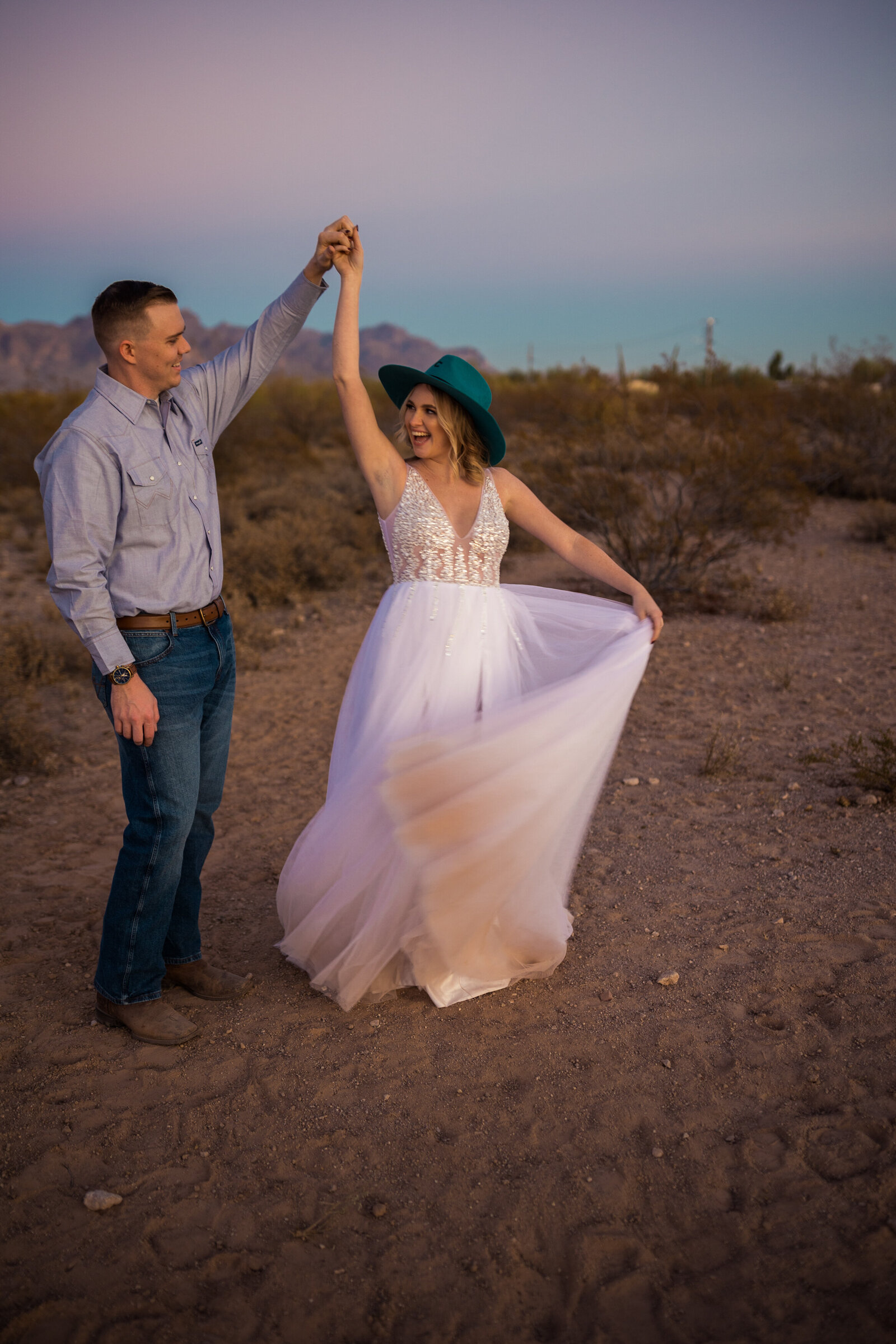 eloping couple two stepping during their first dance in mesa, arizona
