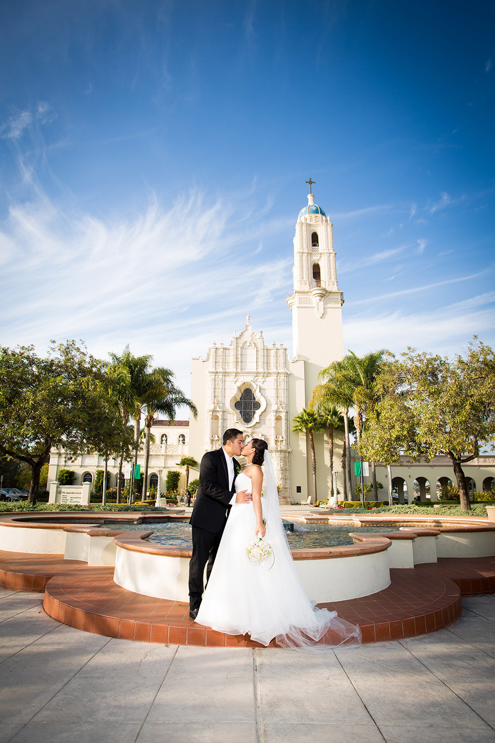 bride and groom in front of the immaculata