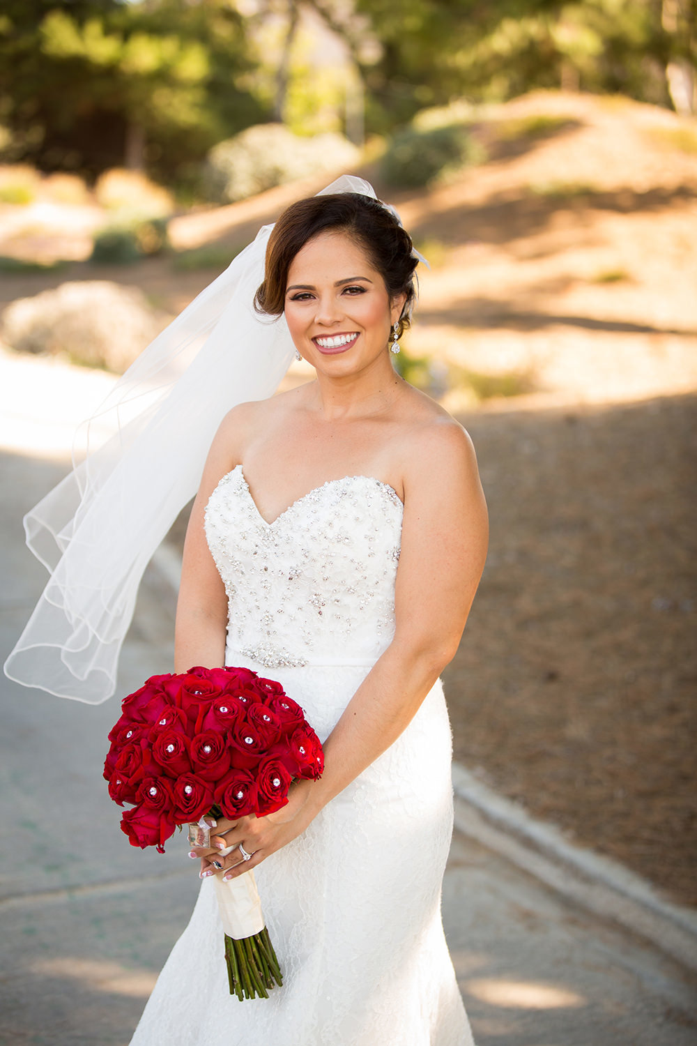 bride smiling with beautiful roses