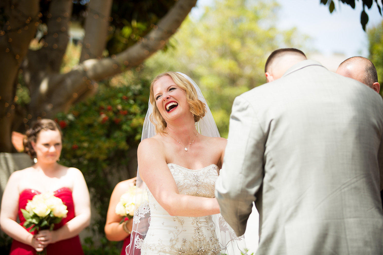 bride laughing at groom saying his vows at darlington house