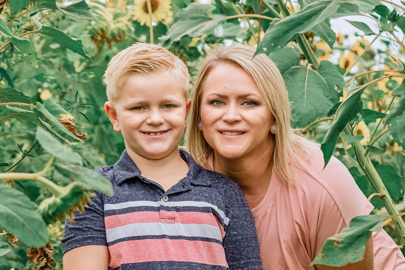 mom and son in sunflowers