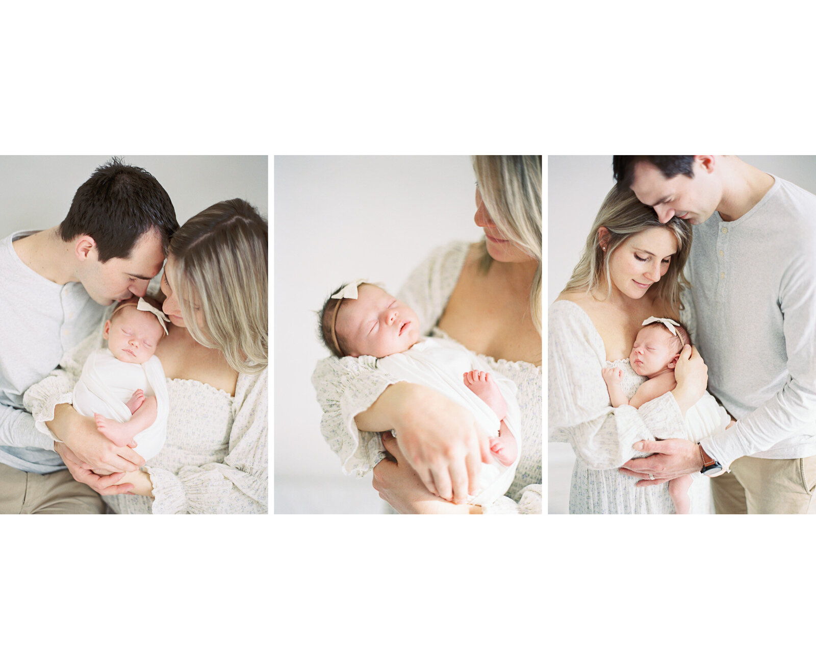 parents holding newborn baby sister on master bed during newborn photos with Milwaukee family photographer, Talia Laird Photography