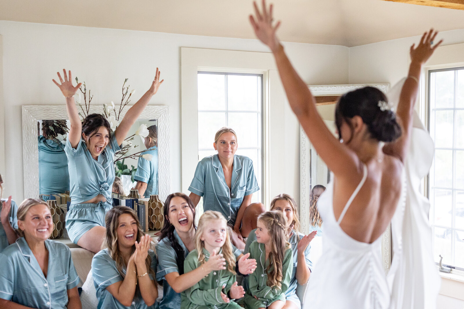 bride and friends cheer