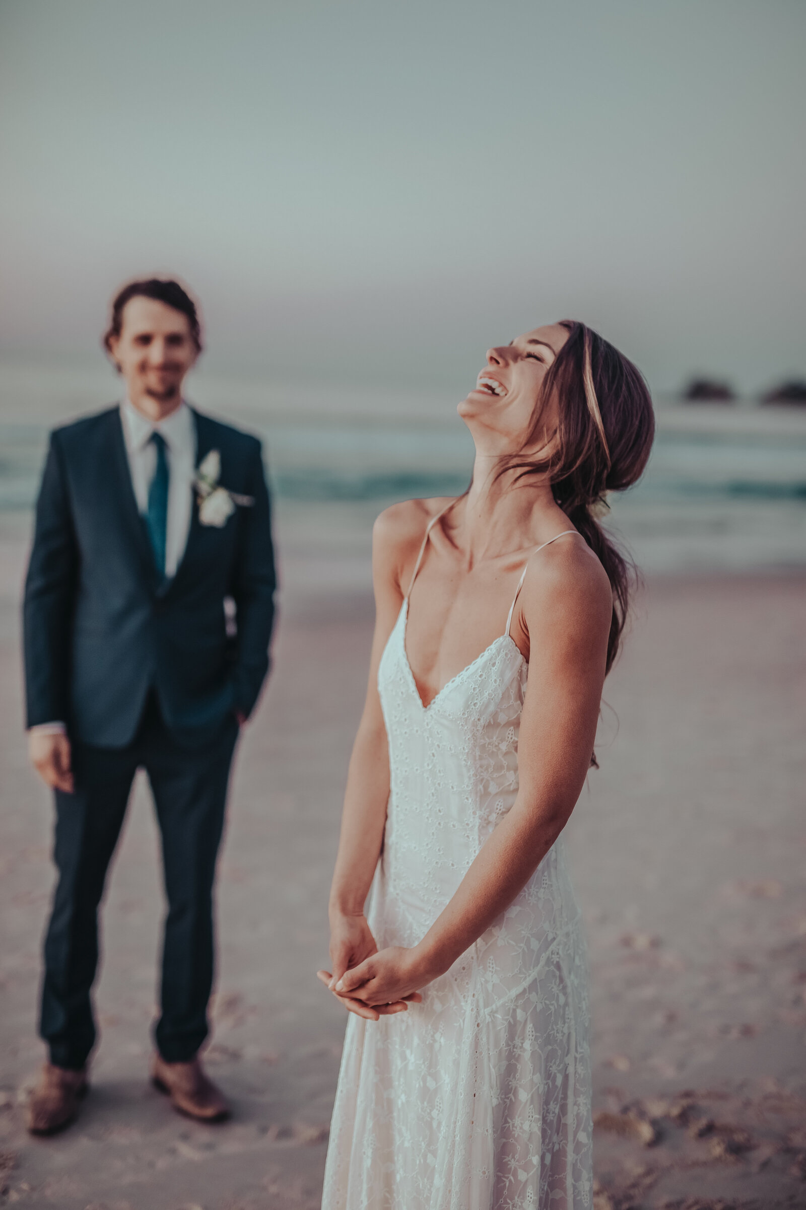 Casual and romantic beach wedding photoshoot with bride and groom