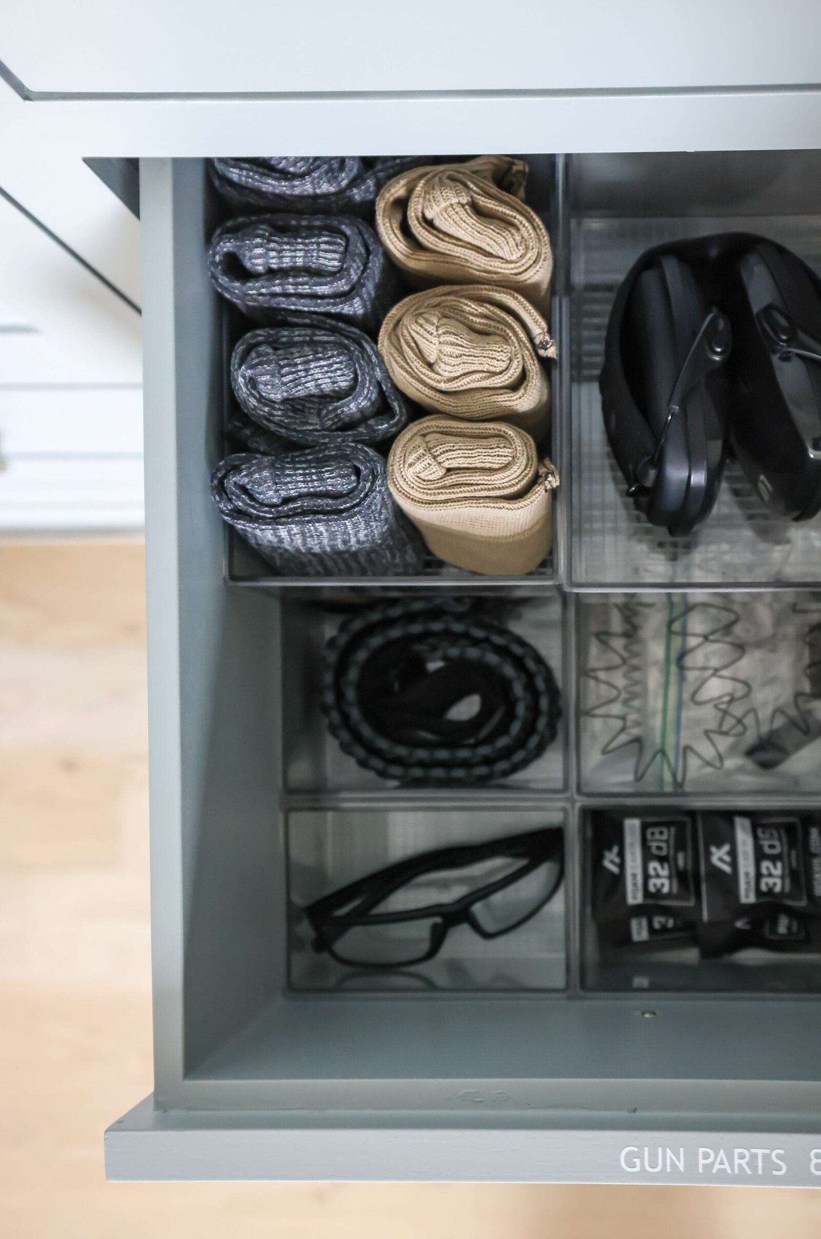 vision and hammer organizing drawer with gun parts and accessories