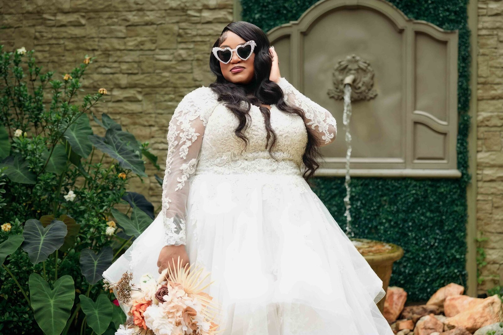 bride pose at The Castle at Wildwood Gardens during her wedding day