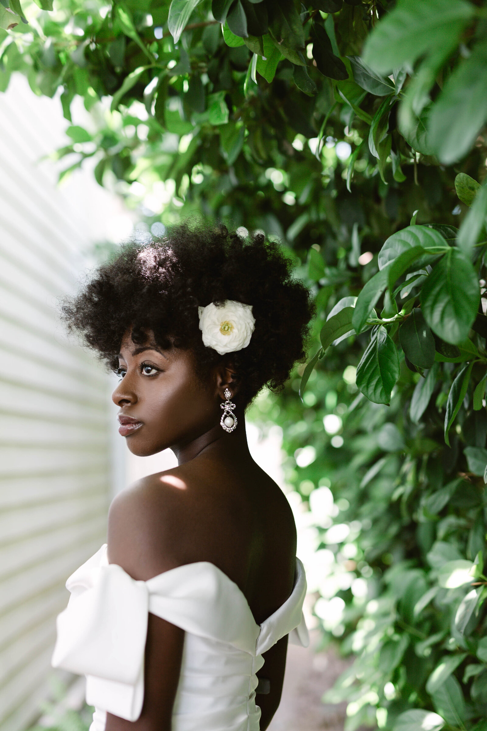 Bride with beautiful skin in New Orleans with  hair flower