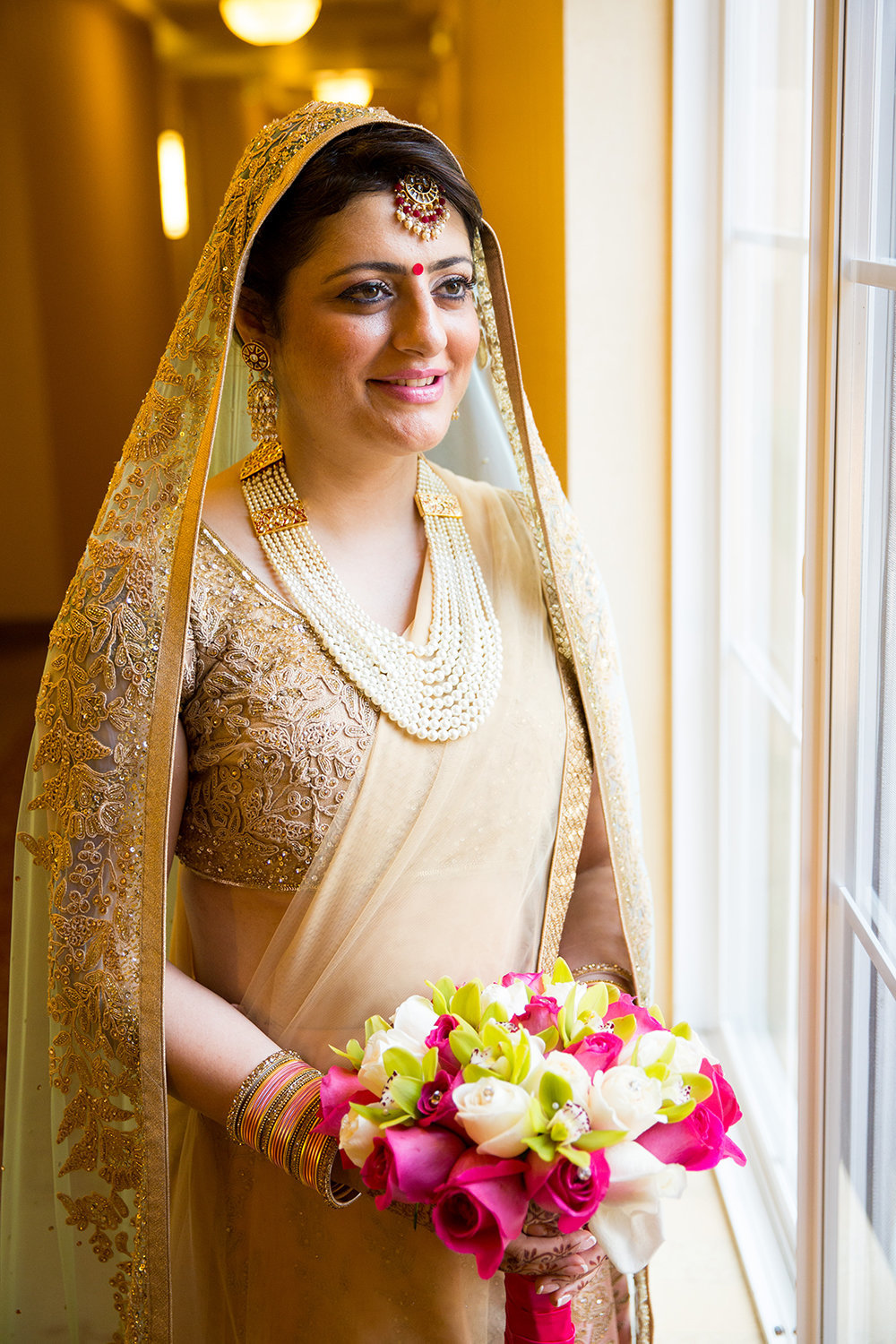 Bridal Portrait of Hindu Bride in Gold Sari