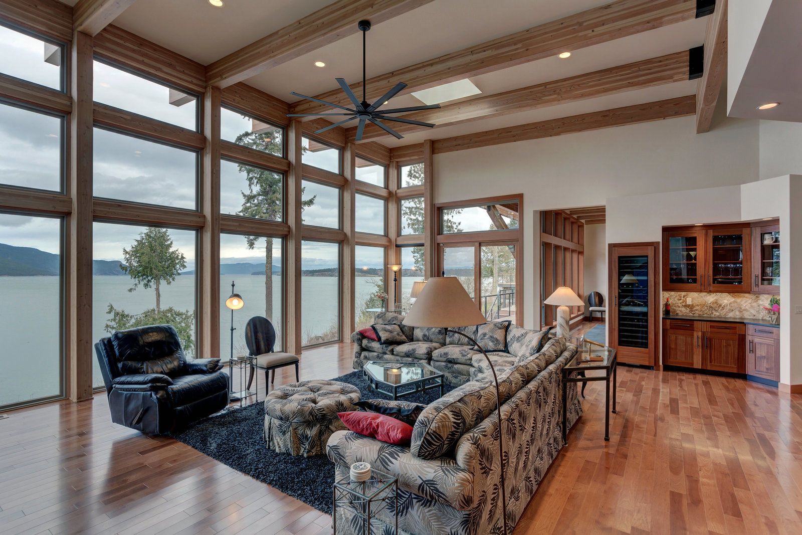 exposed beam living room with water view