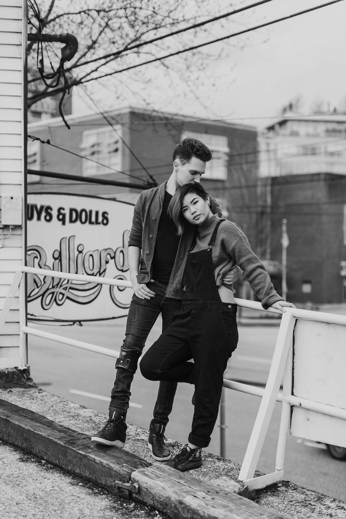 Cool stylish couple posing on Main street in Vancouver BC