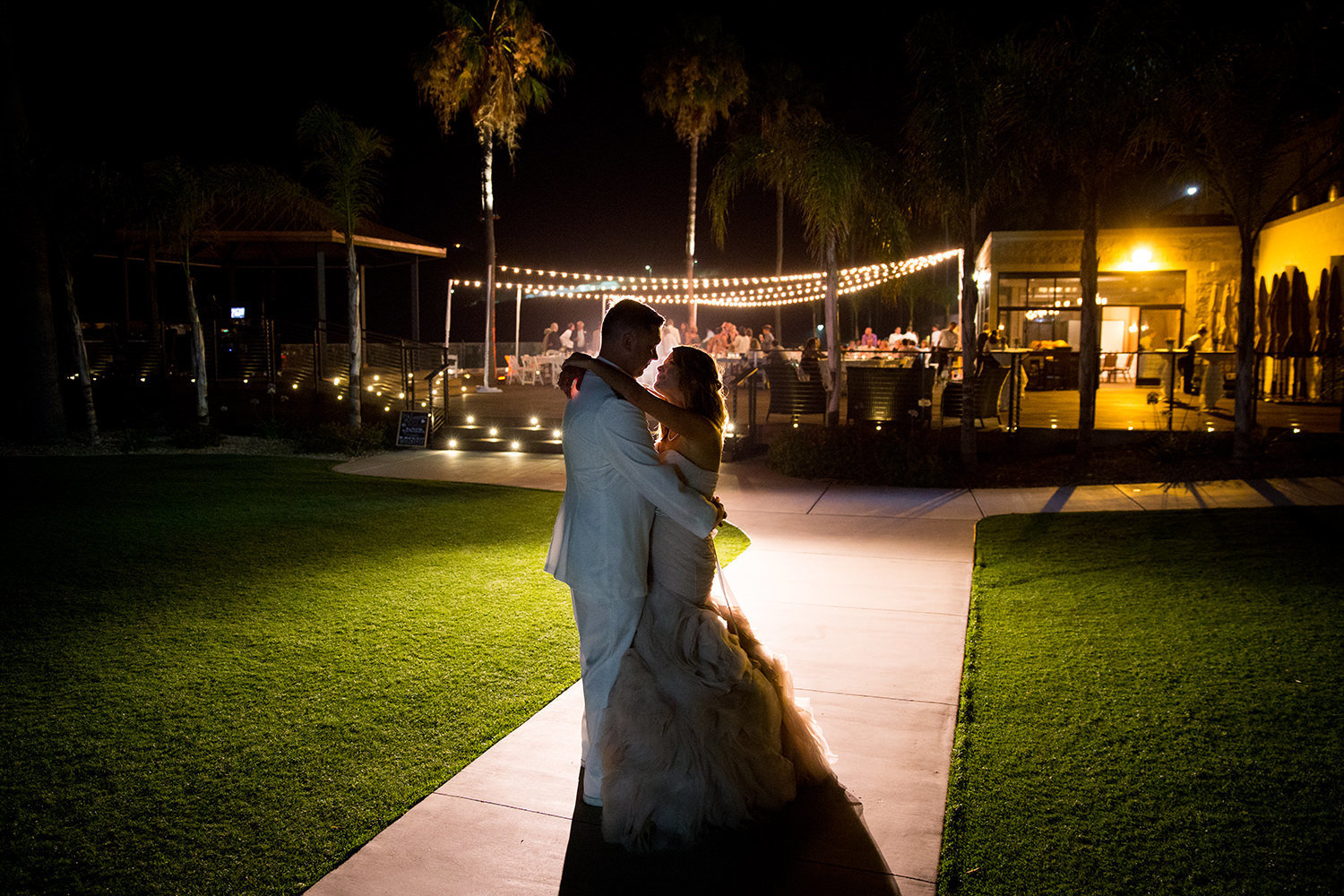 night image of bride and groom at ocean view room