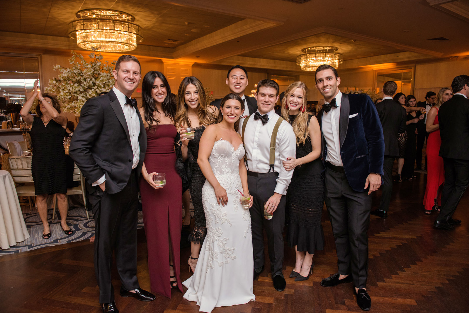 bride and groom with guests during the reception at Glen Head Country Club