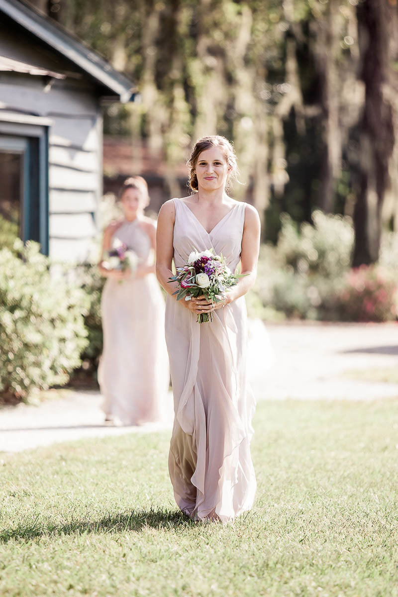 Bridesmaids walk up the aisle, Magnolia Plantation, Charleston, South Carolina