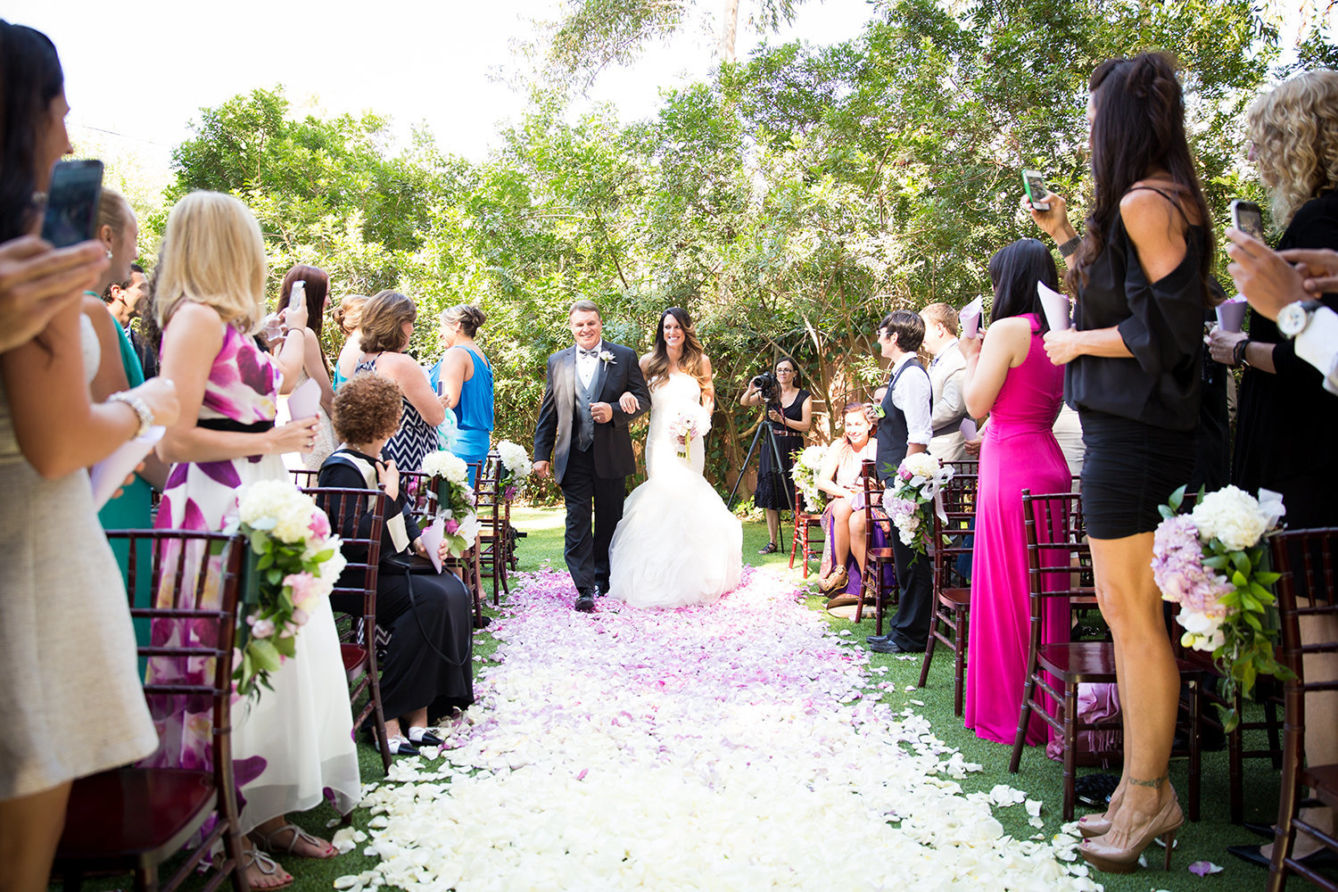 Here comes the bride | Colorful flower petal aisle wedding decorations
