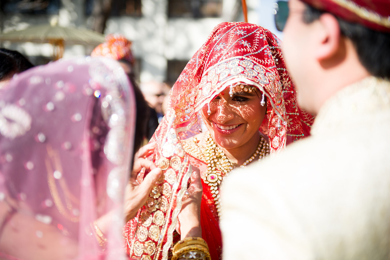 Hindu bride hidden under her veil during the Baraat