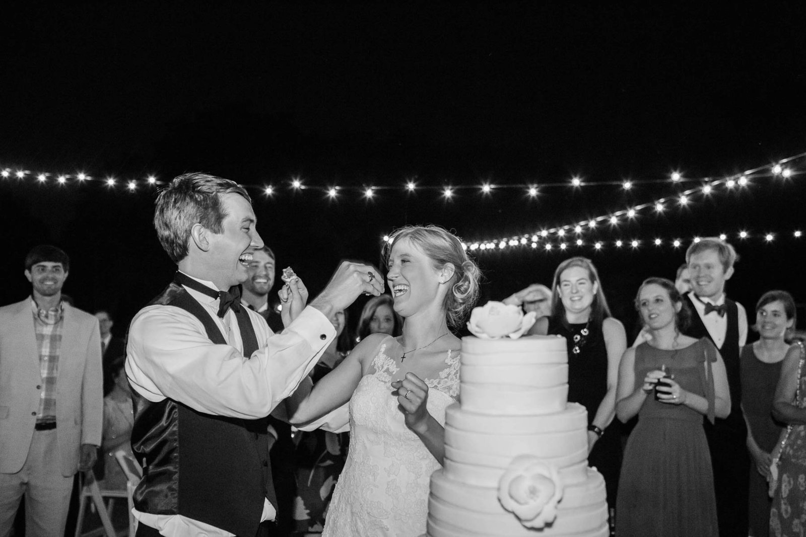 Bride and groom cut the cake, Oakland Plantation, Mt Pleasant, South Carolina