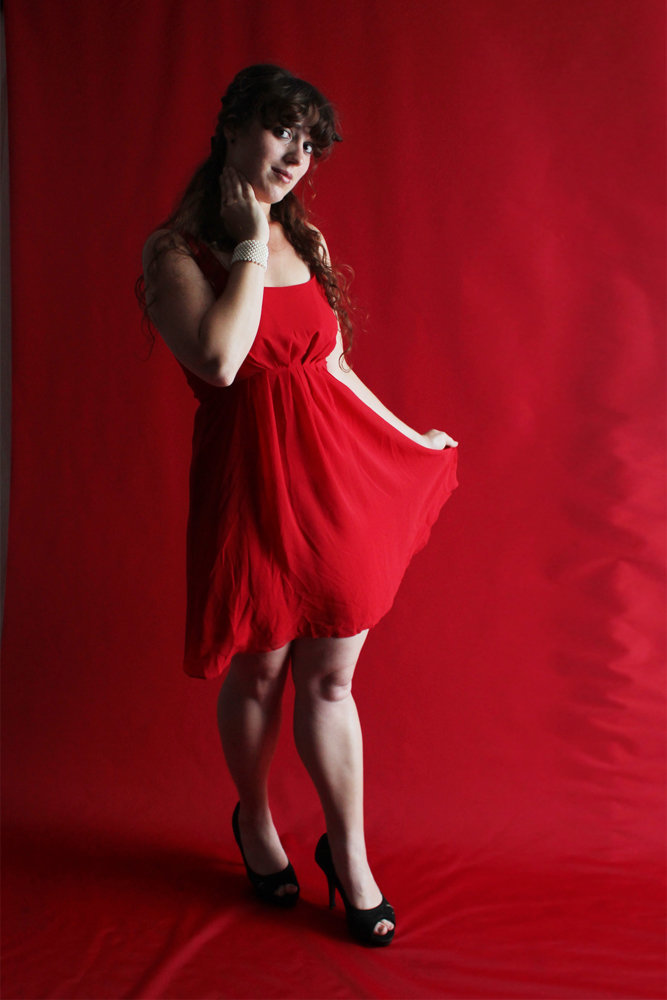 Red dress, happy girl, backdrop