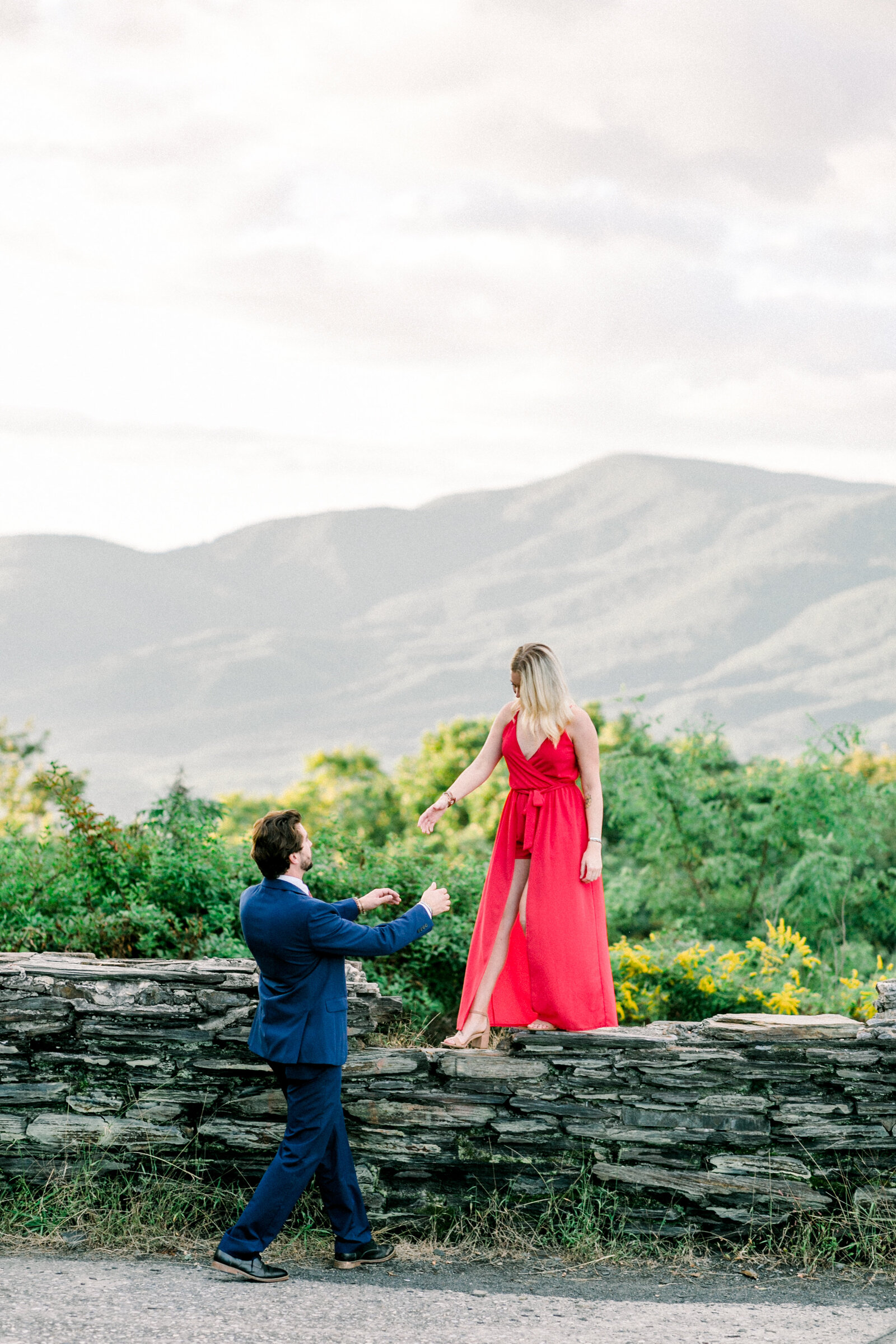 Sweet couple with a beautiful view captured by Staci Addison Photography