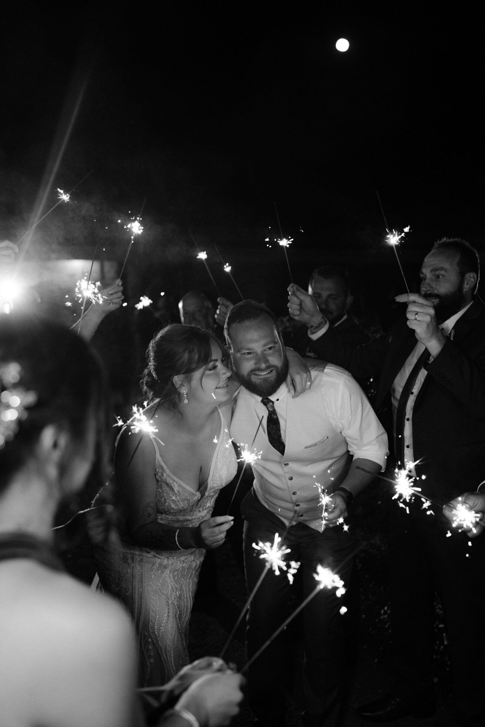 Canberra wedding photo of couple in balck and white with sparklers around them