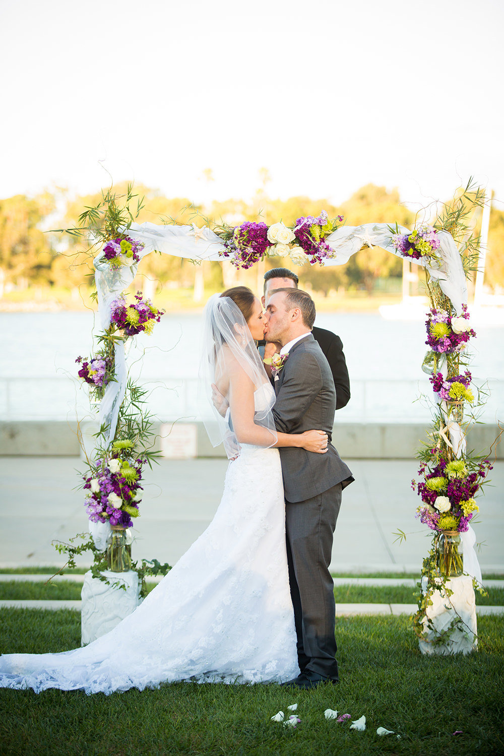 bride and groom at beautiful ceremony space coronado community center first kiss