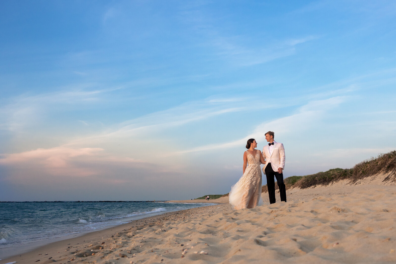 bride and groom on gallery beach nantucket