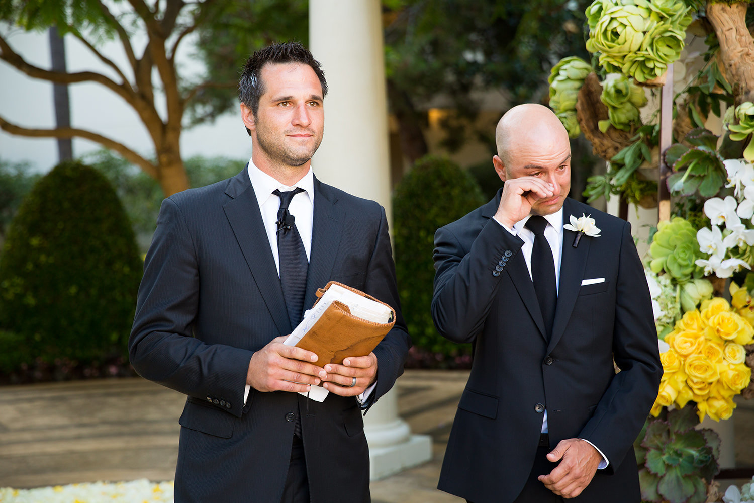 The groom's emotions begin to show when he sees his bride for the first time