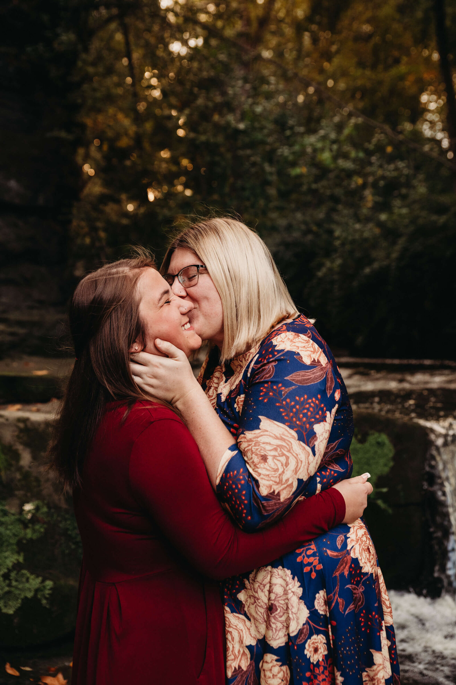 LGBTQ couple embrace in fall session in Cleveland.