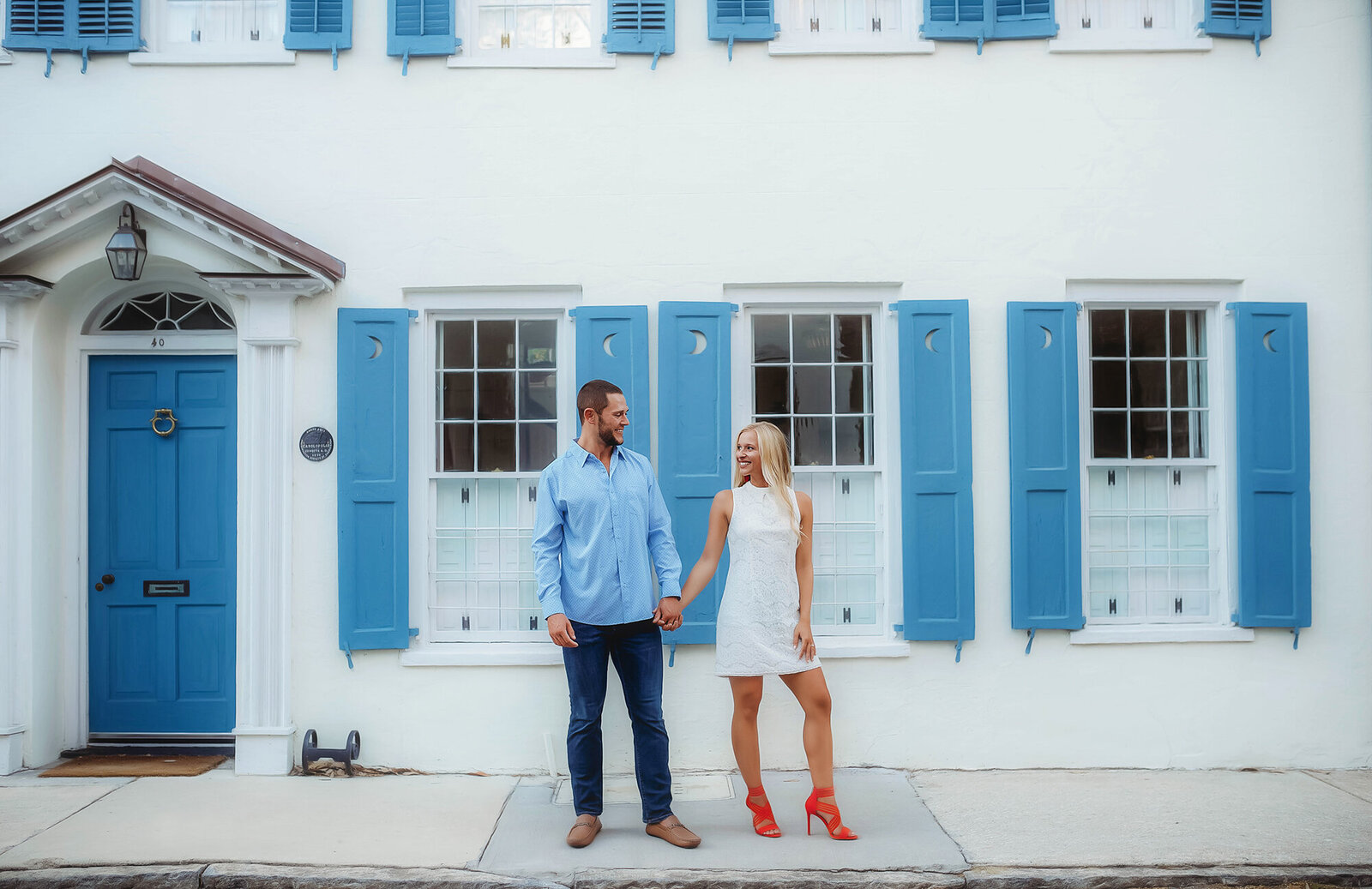 A couple poses for Engagement Photos in Charleston, SC.