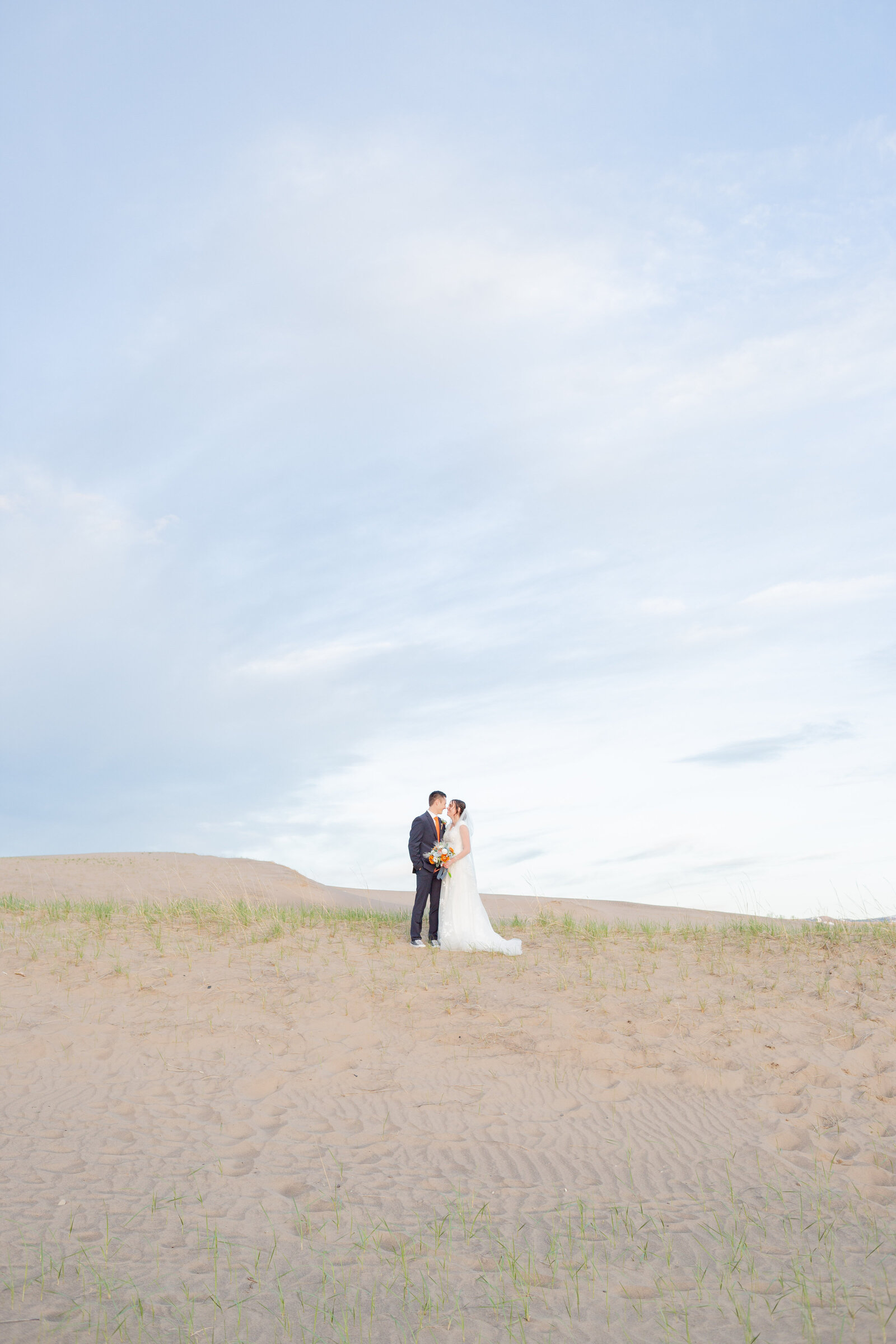 Washington Elopement Photographer captures bride and groom on beach after PNW wedding