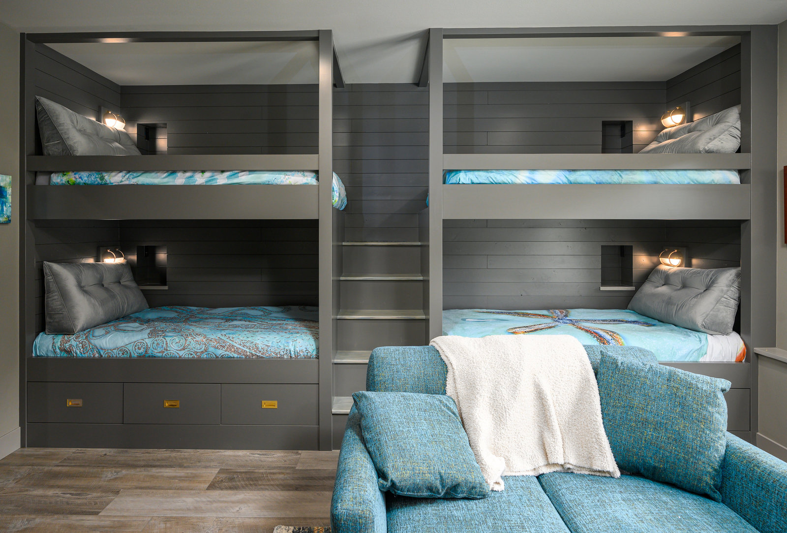 modern guest bedroom with floor to ceiling bunk beds