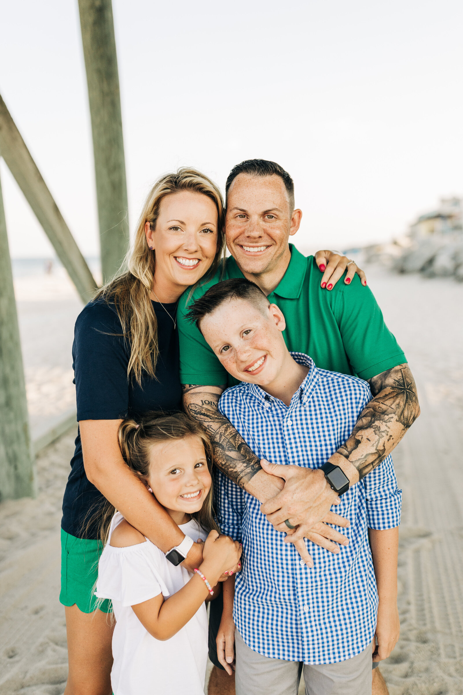 Family Photos on the Beach Under the Pier  | Wilmington NC | The Axtells Photo and Film
