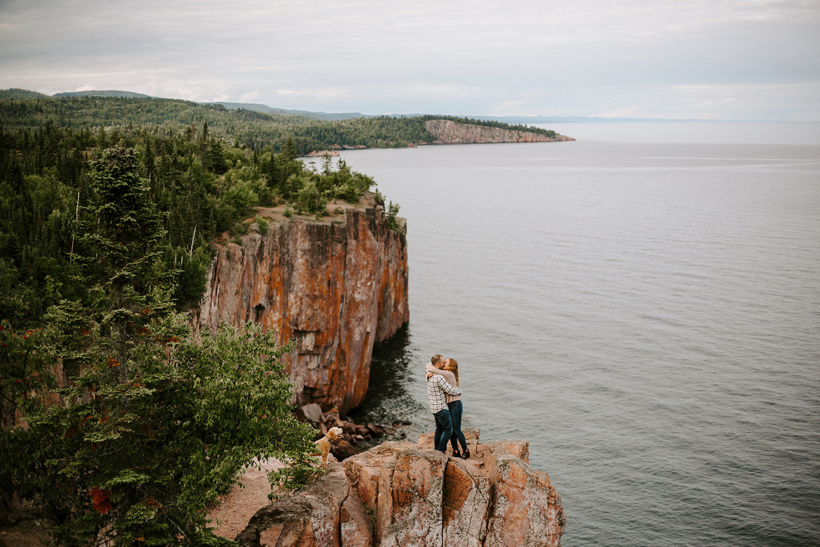 Couple kissing at Palaside head in North Shore during their MInnesota engagement session